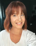 Laura T.